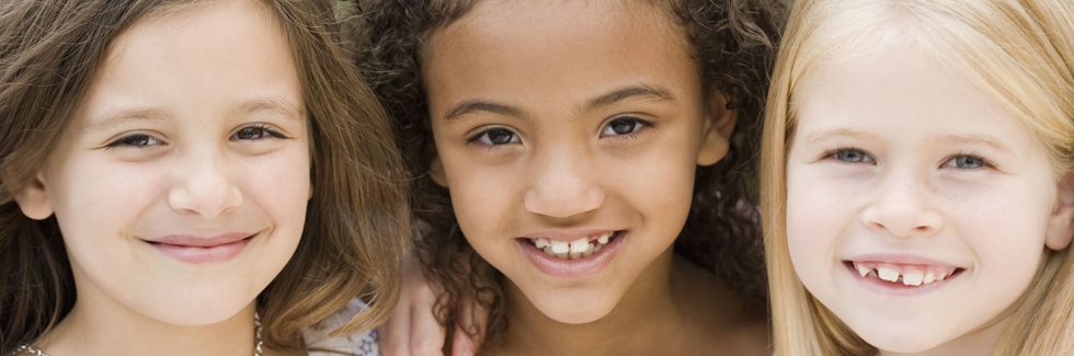 Close up of multi-ethnic girls smiling